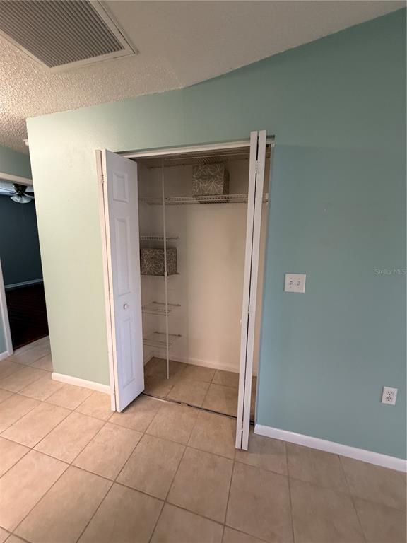 2131 Ridge Road South, Unit 135 Largo, FL 33778 - Photo 8 of 33 an empty room with closet