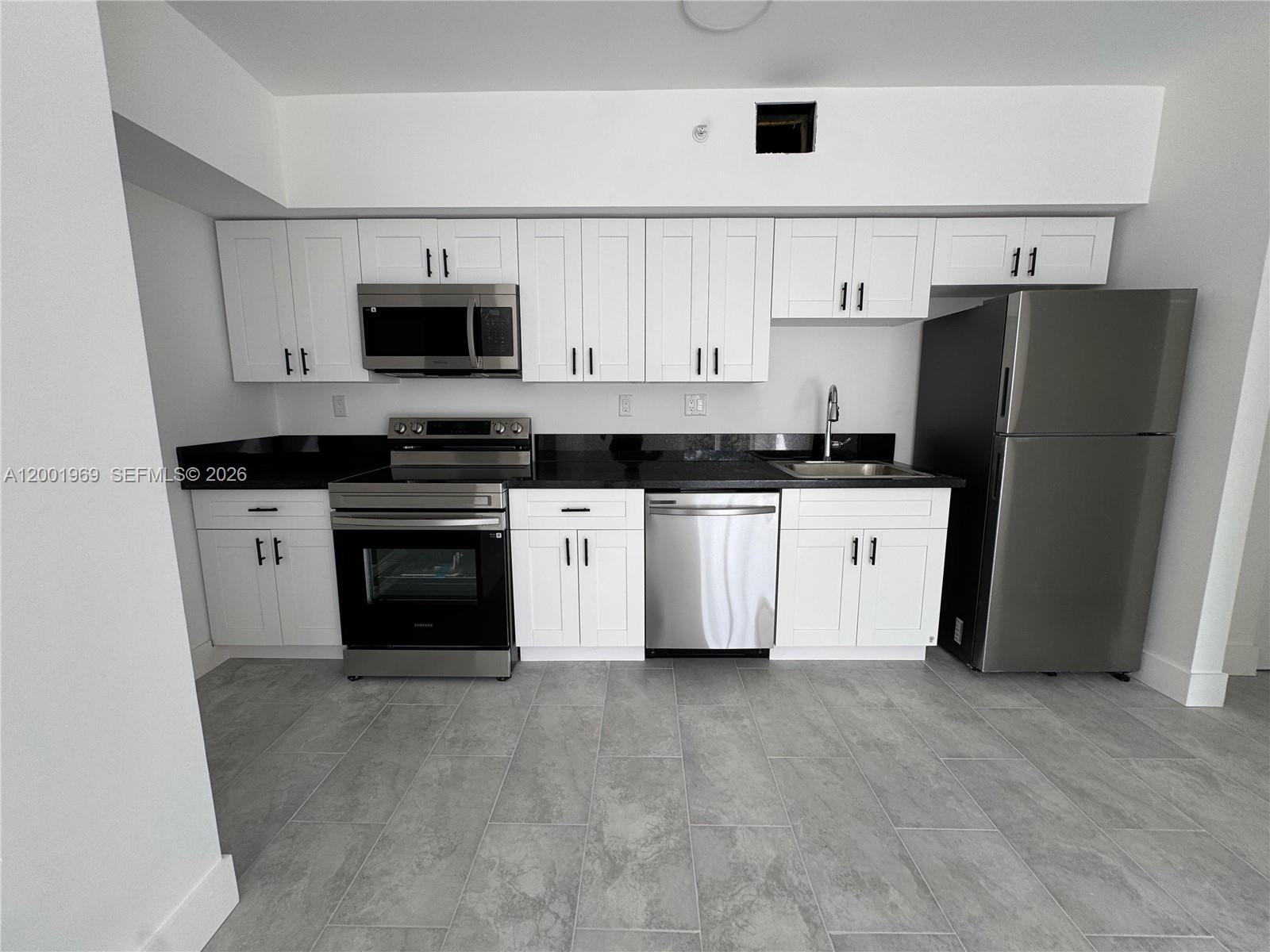 147 Northwest 59th Street, Unit 303 Miami, FL 33127 - Photo 3 of 13
