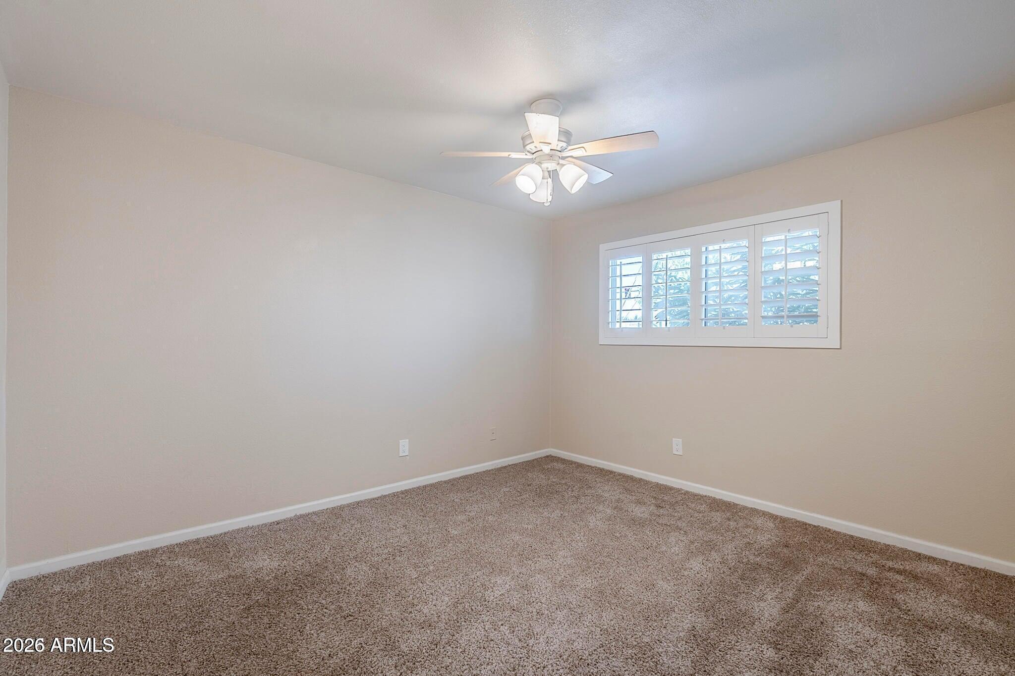 5525 East Thomas Road, Unit C2 Phoenix, AZ 85018 - Photo 18 of 35 Guest Bedroom