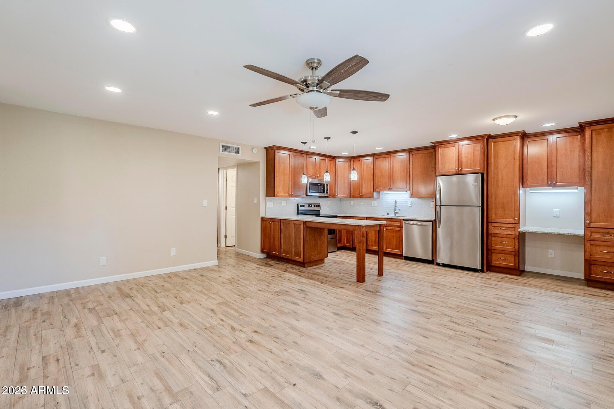 5525 East Thomas Road, Unit C2 Phoenix, AZ 85018 - Photo 7 of 35 Living Room - Kitchen
