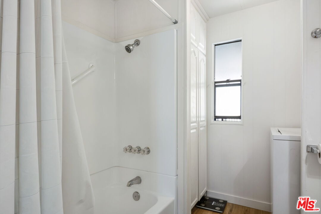 1502 East Carson Street, Unit 5 Carson, CA 90745 - Photo 7 of 10 a bathroom with a bathtub