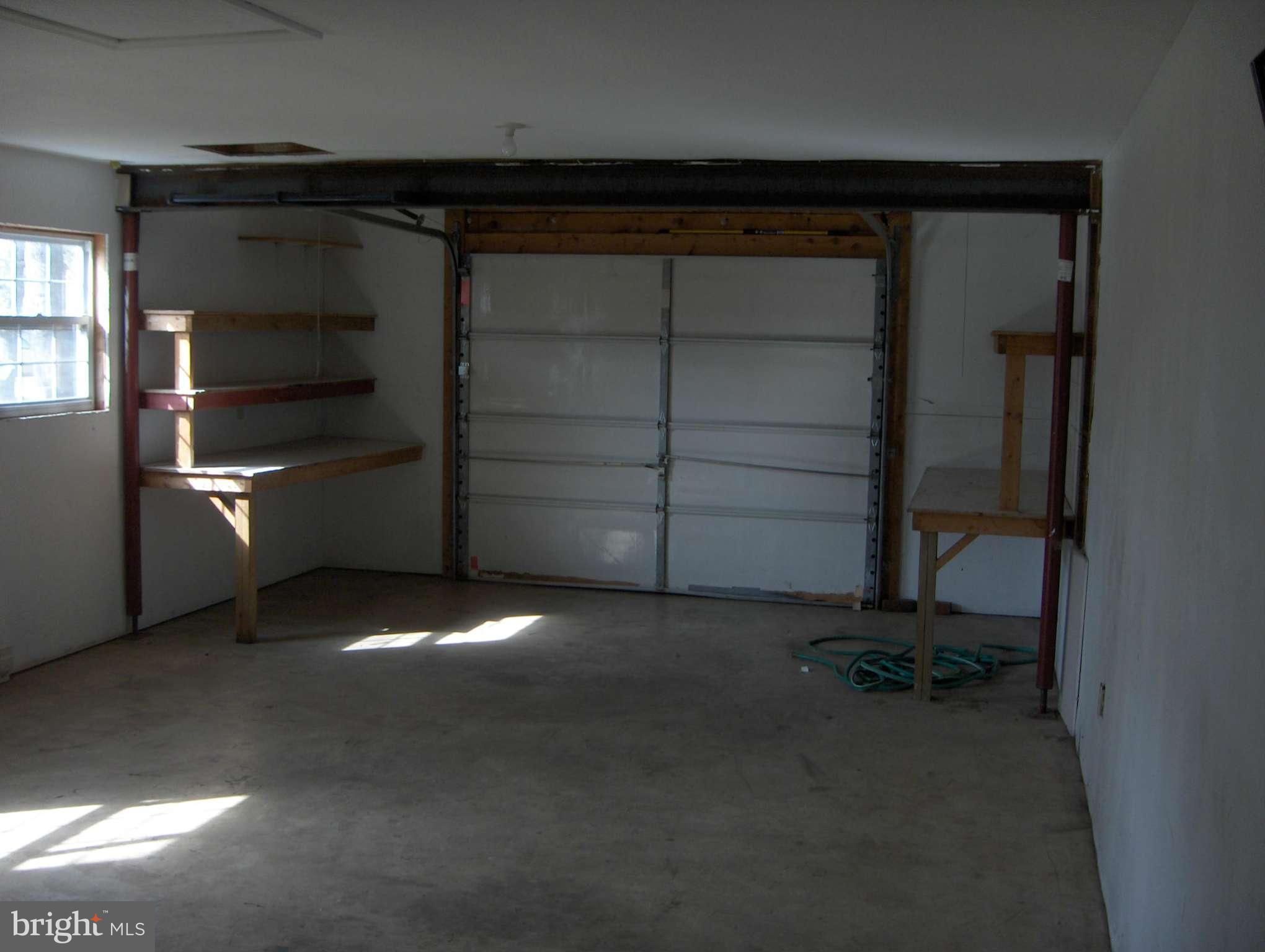 54 Crab Apple Lane Ranson, WV 25438 - Photo 15 of 16 Finished garage, storage, exercise, whatever