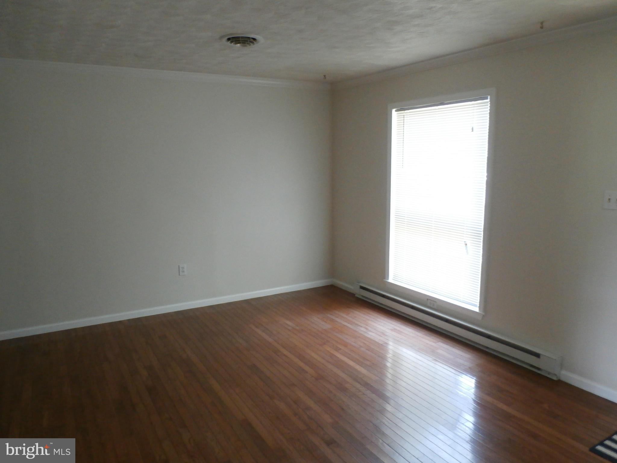 54 Crab Apple Lane Ranson, WV 25438 - Photo 8 of 16 Living Room, wood floors