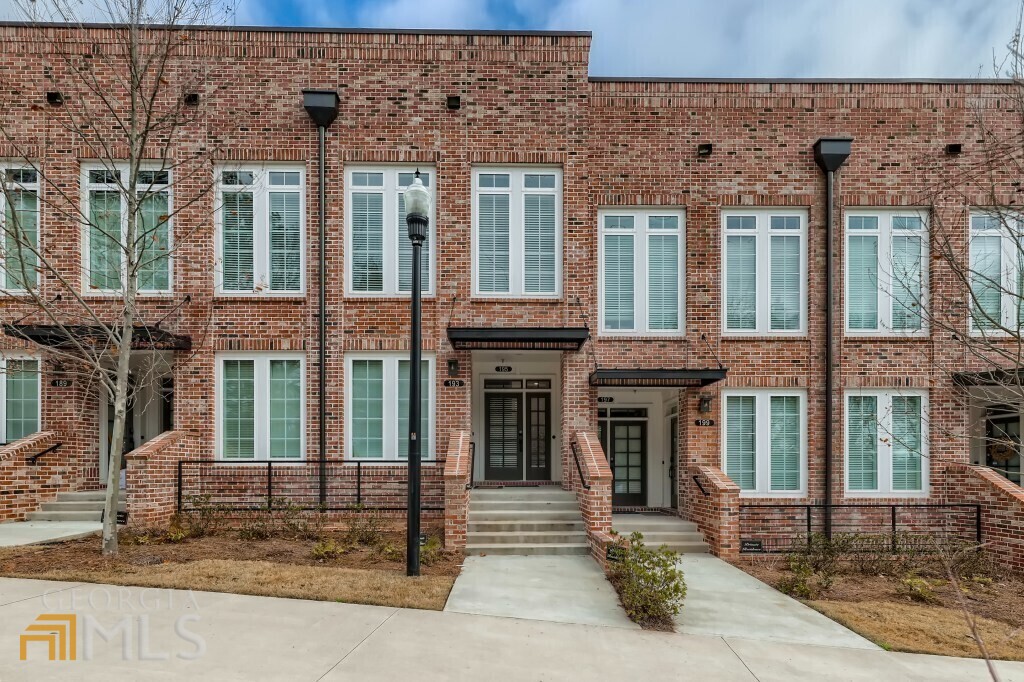 195 Devore Road, Unit 606 Alpharetta, GA 30009 - Photo 1 of 1 front view of a house with a yard