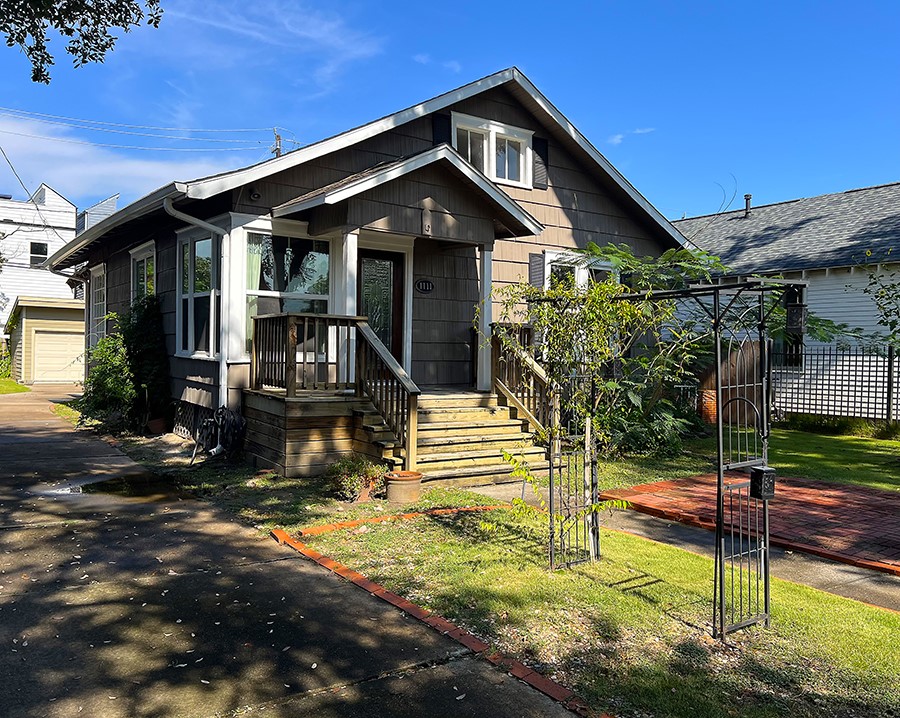 1111 Rutland Street Houston, TX 77008 - Photo 1 of 43 a front view of a house with a yard