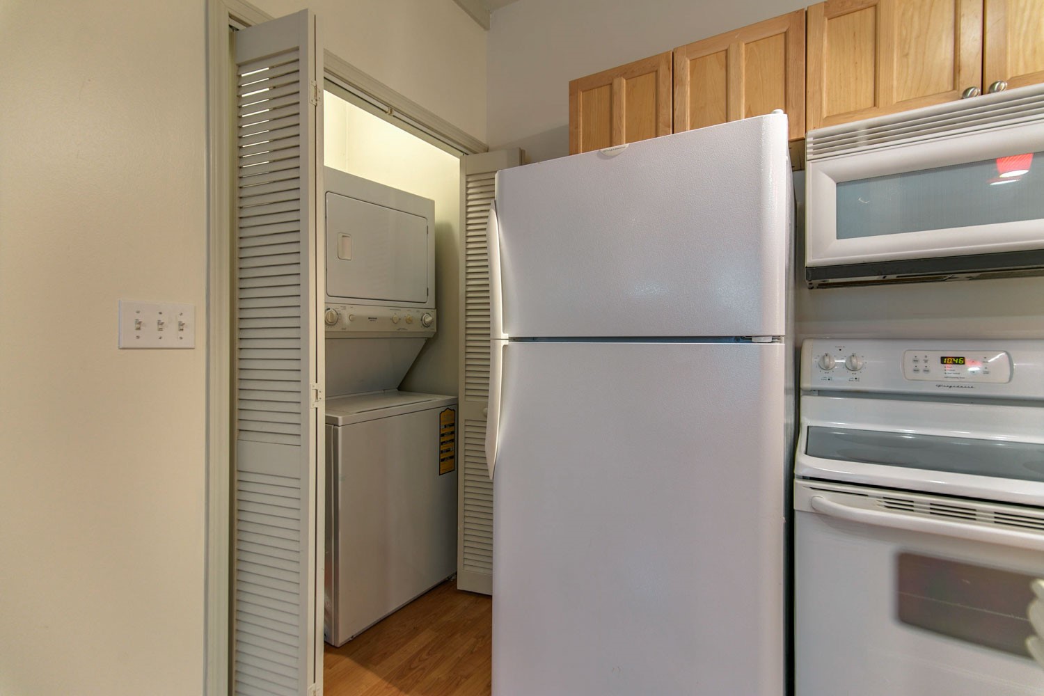 1111 Rutland Street Houston, TX 77008 - Photo 33 of 43 a white refrigerator freezer and a stove sitting inside of a kitchen