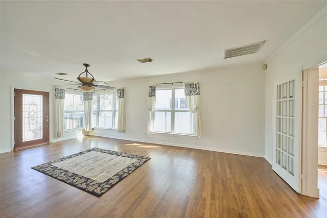 a kitchen with stainless steel appliances granite countertop a refrigerator a sink and dishwasher