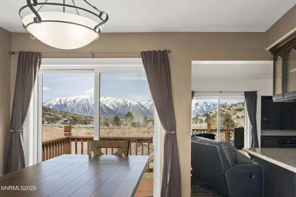 a view of a livingroom with furniture window and wooden floor