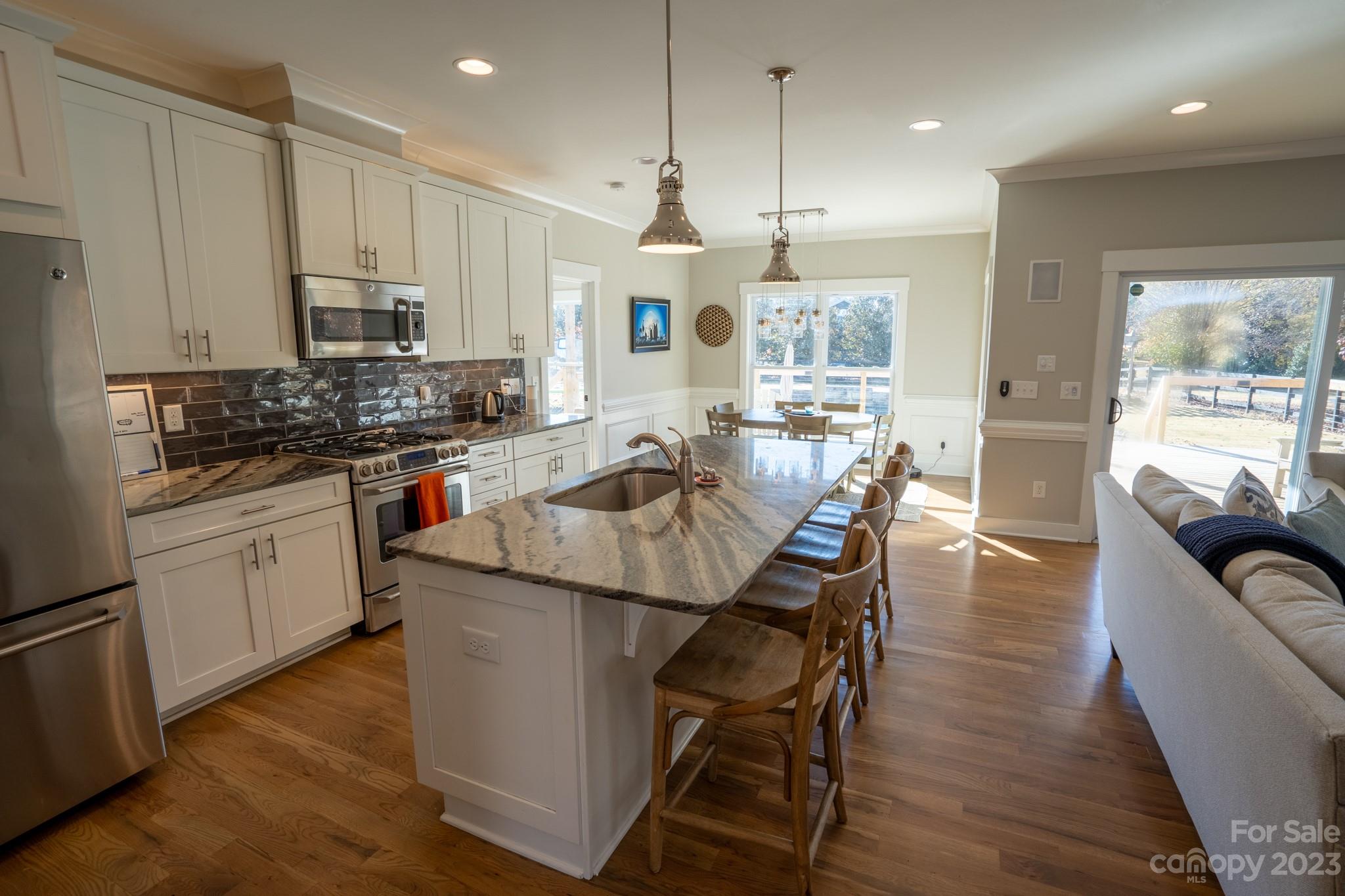 1411 Mary Ellen Drive Fort Mill, SC 29708 - Photo 16 of 37 a kitchen with counter top space a sink appliances and cabinets