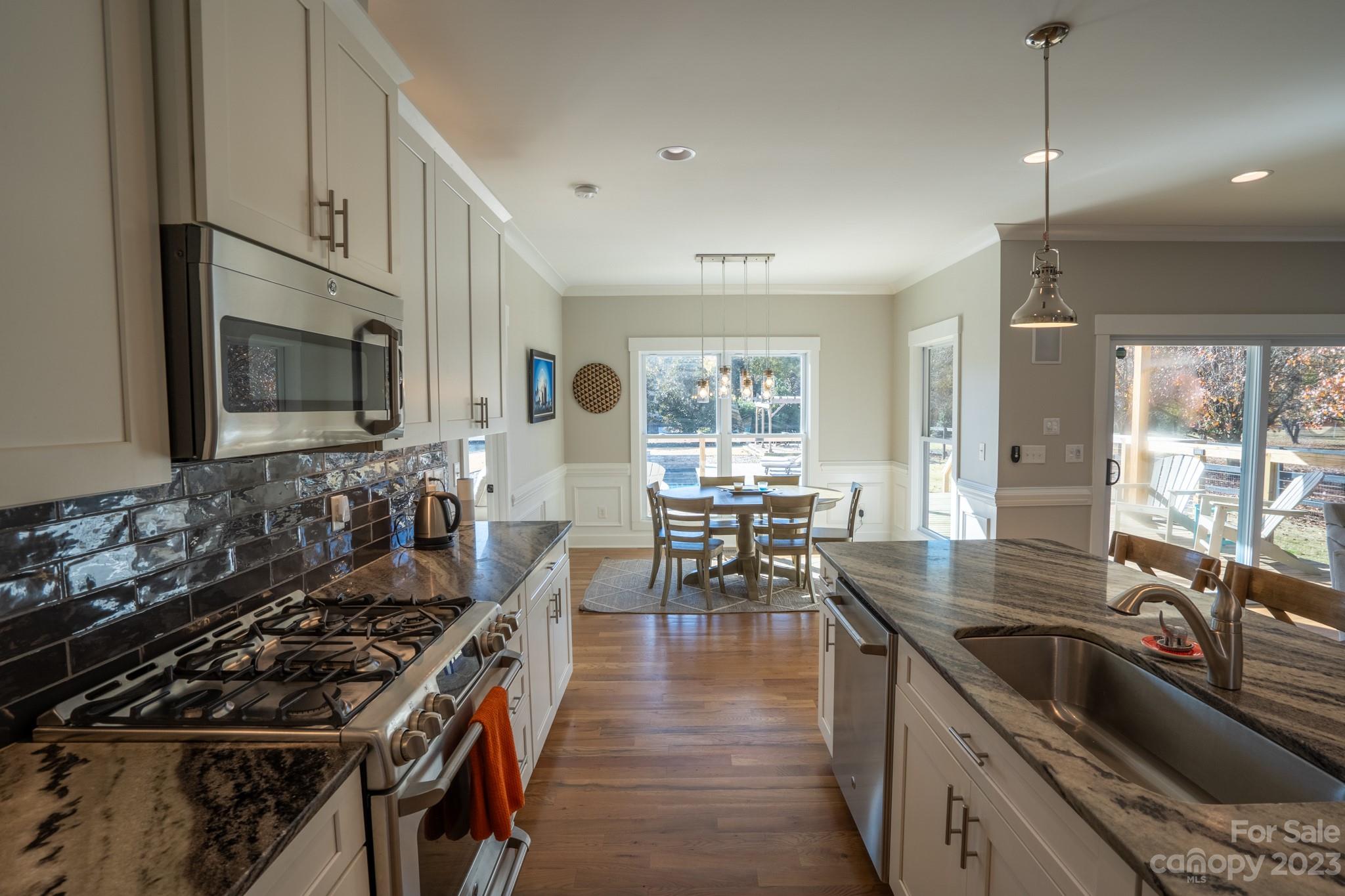 1411 Mary Ellen Drive Fort Mill, SC 29708 - Photo 19 of 37 a kitchen with granite countertop lots of counter top space