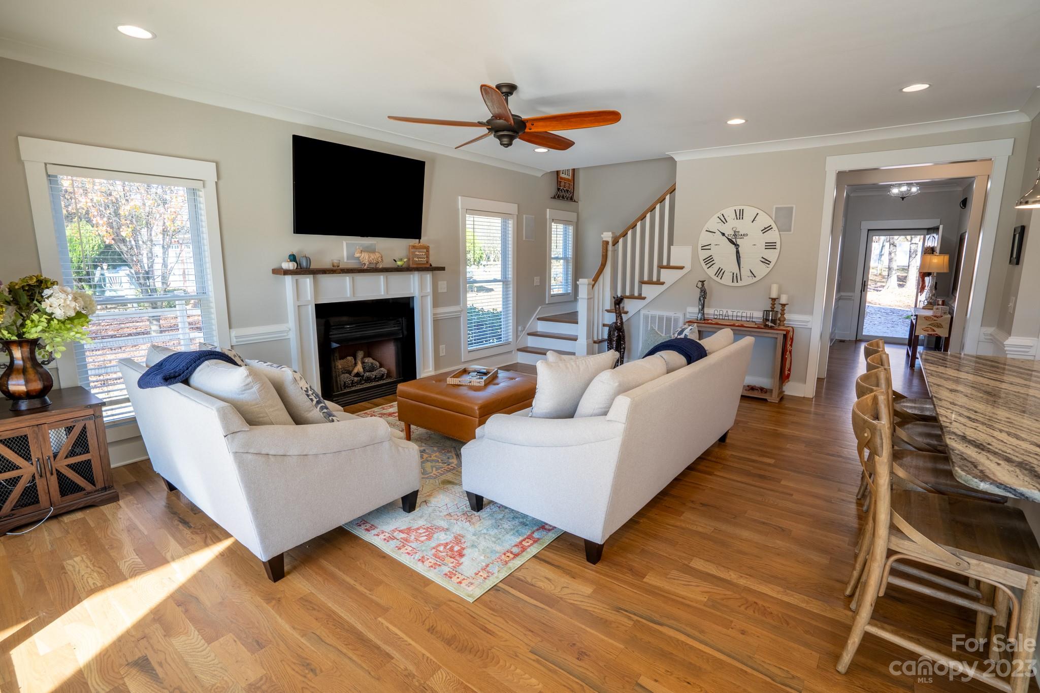 1411 Mary Ellen Drive Fort Mill, SC 29708 - Photo 22 of 37 a living room with furniture fireplace and flat screen tv