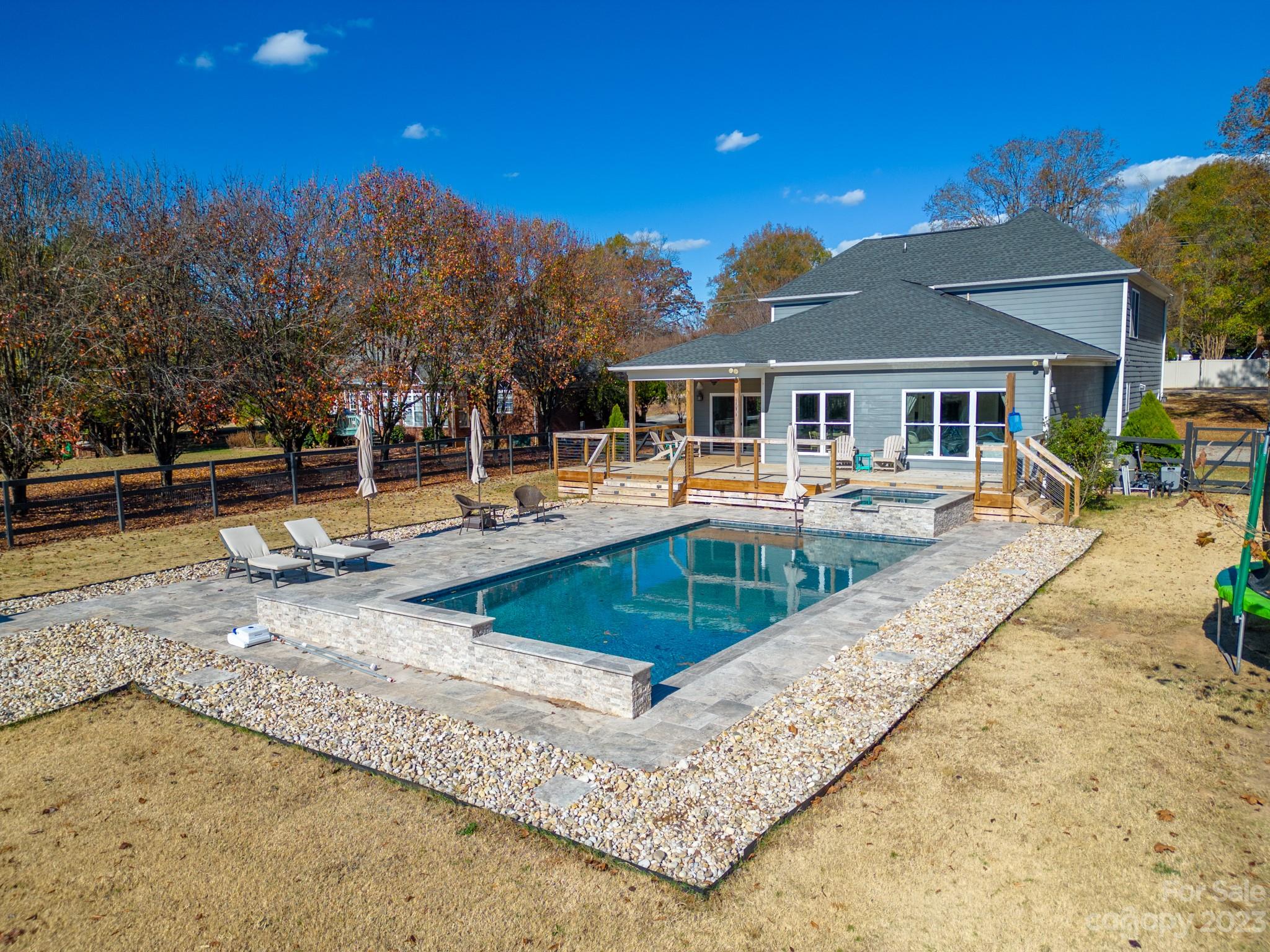 1411 Mary Ellen Drive Fort Mill, SC 29708 - Photo 6 of 37 a view of a house with swimming pool and sitting area