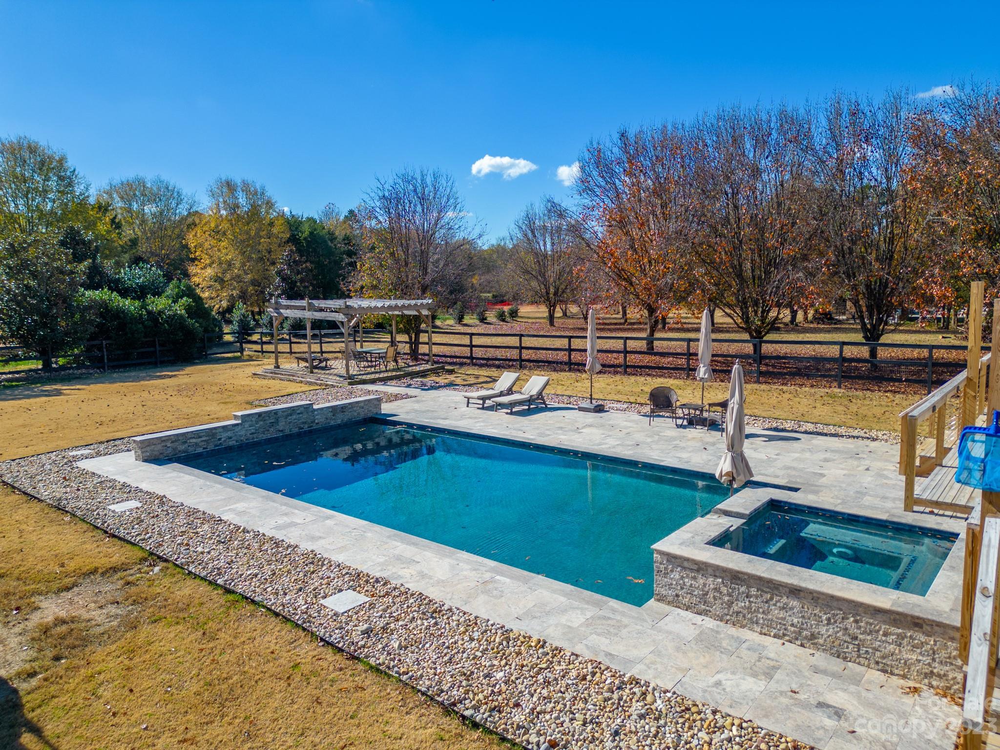 1411 Mary Ellen Drive Fort Mill, SC 29708 - Photo 7 of 37 a view of a swimming pool with lounge chairs