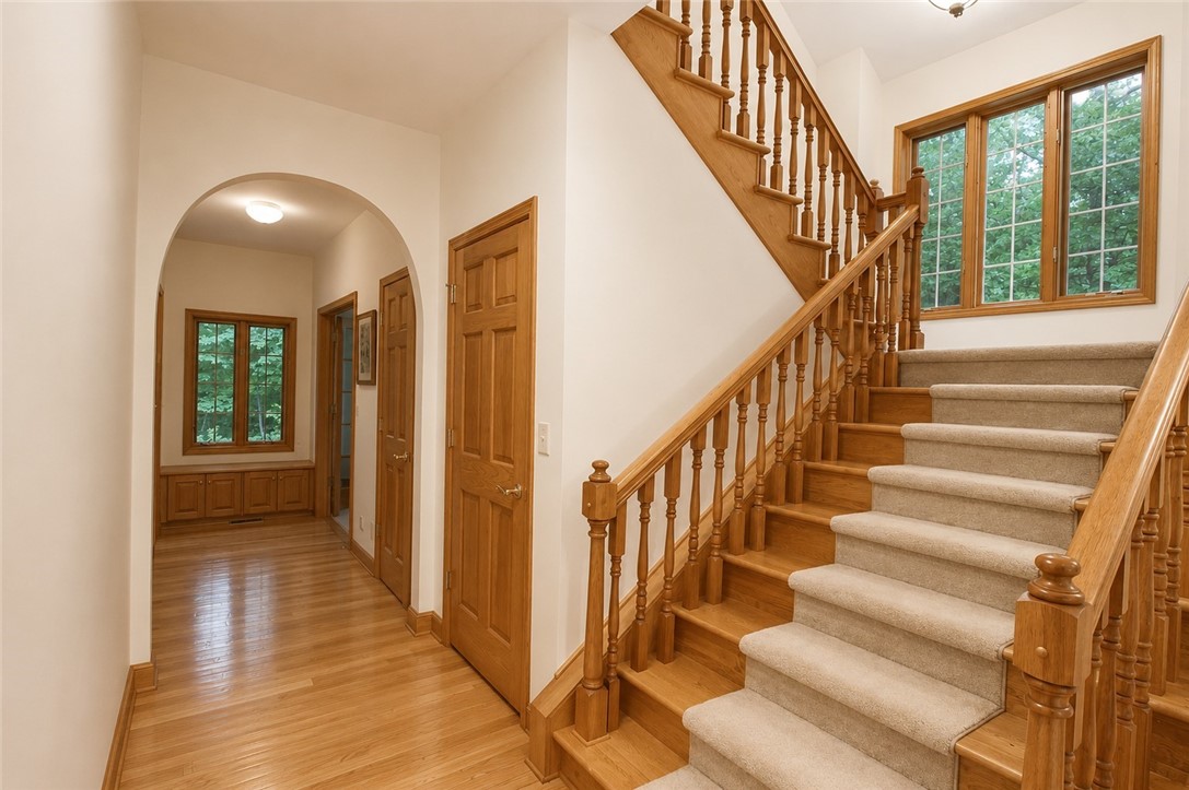 59 Kickapoo Valley Drive Charleston, IL 61920 - Photo 15 of 46 a view of entryway with wooden floor and stairs