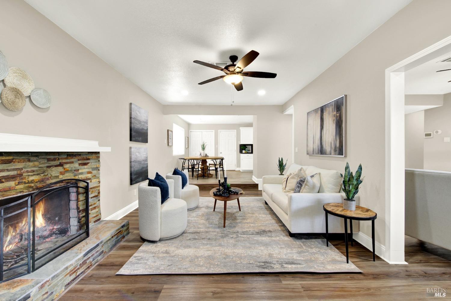 314 Tulip Street Fairfield, CA 94533 - Photo 6 of 11 a living room with furniture and a fireplace