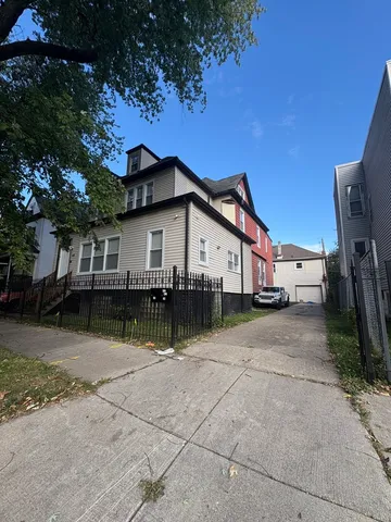 a view of a house with a patio