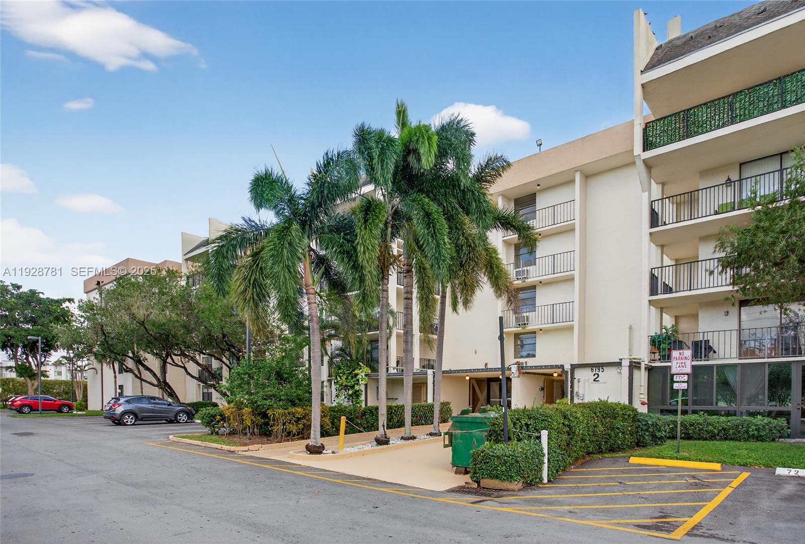 a view of a street with a building in the background
