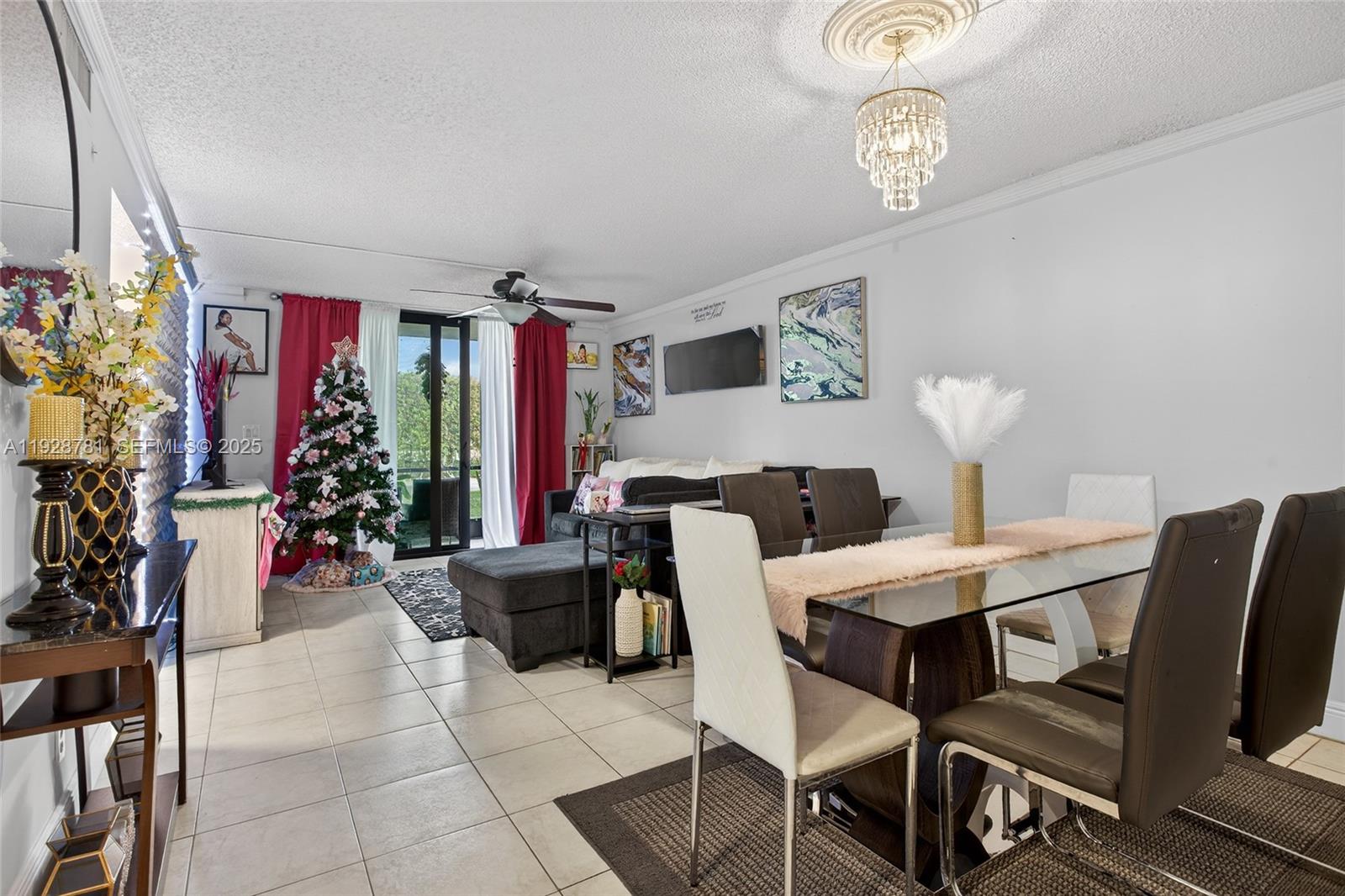6195 Rock Island Road, Unit 103 Tamarac, FL 33319 - Photo 15 of 27 a view of a livingroom and dining room