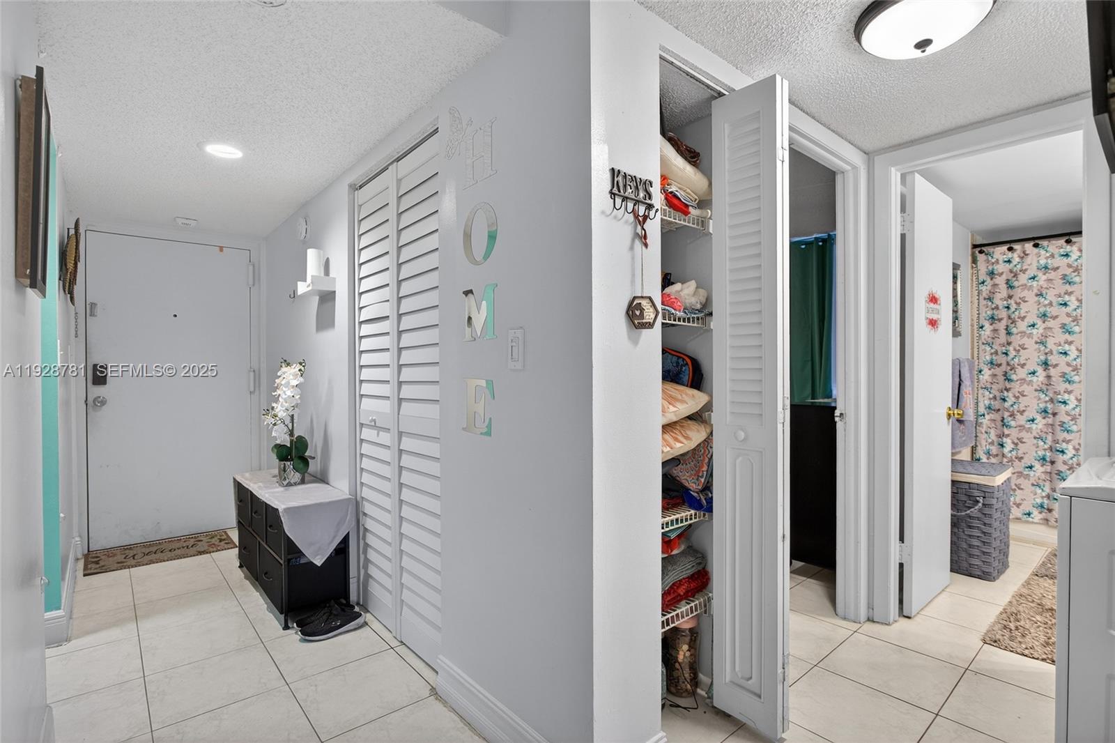 6195 Rock Island Road, Unit 103 Tamarac, FL 33319 - Photo 10 of 27 a bathroom with a bathtub and shower