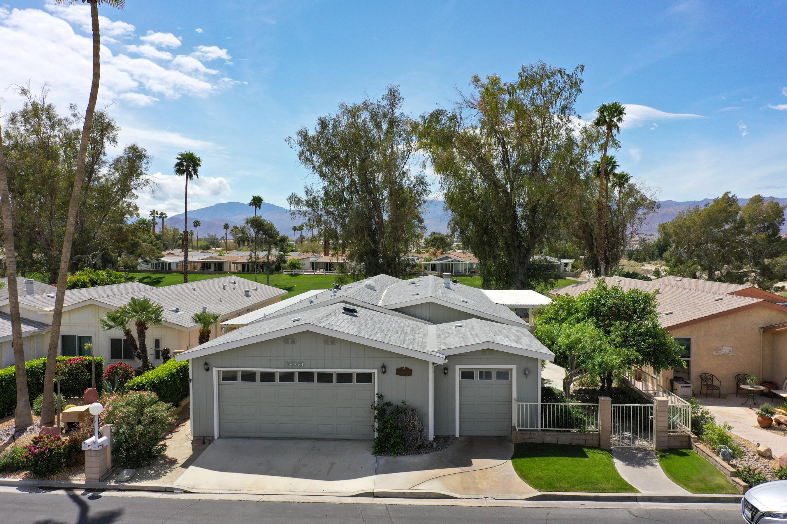 74631 Mexicali Rose Thousand Palms, CA 92276 - Photo 1 of 38 74631 Mexicali Rose-DRONE-2