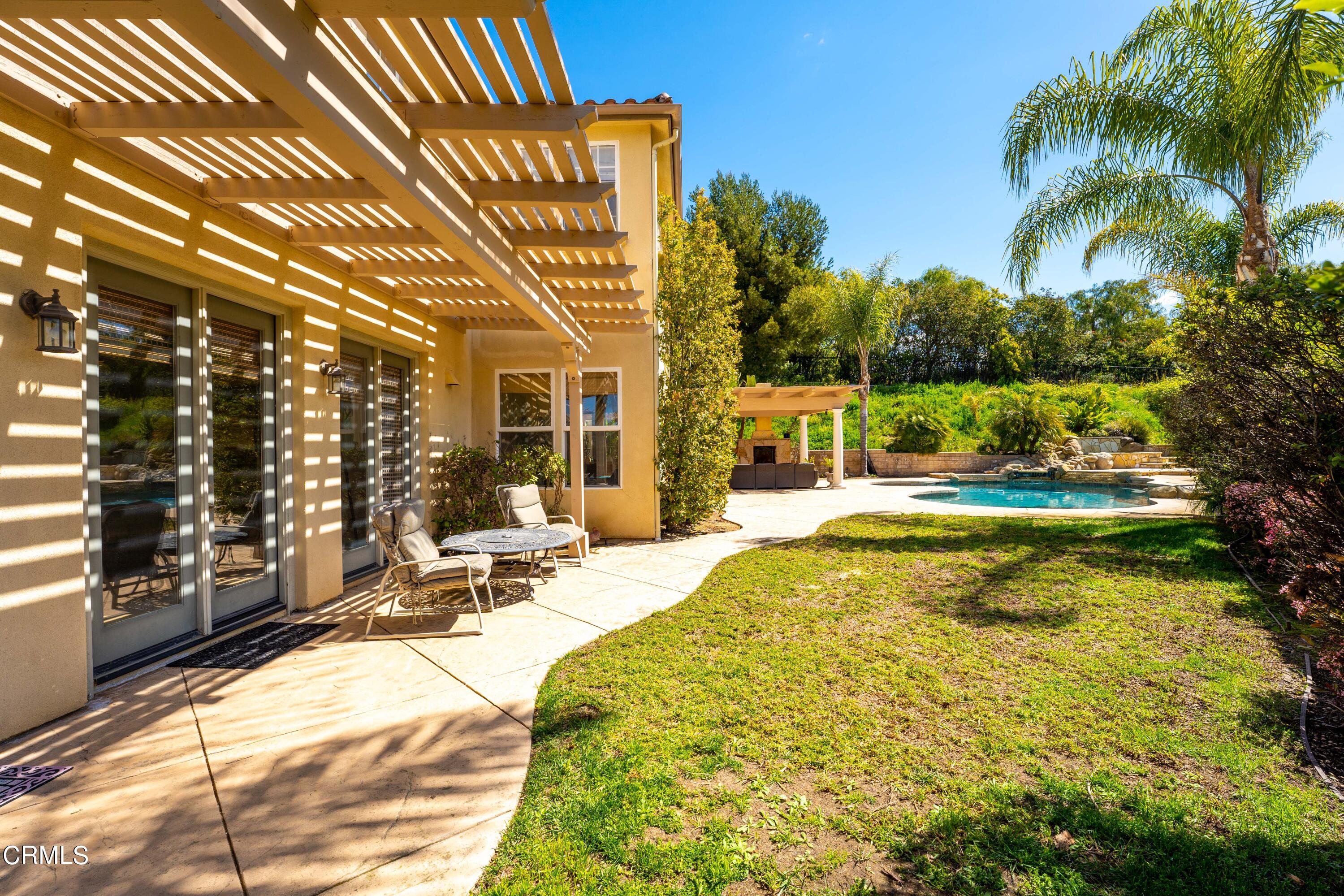 2510 Worth Way Camarillo, CA 93012 - Photo 14 of 75 a view of swimming pool with outdoor seating and a yard