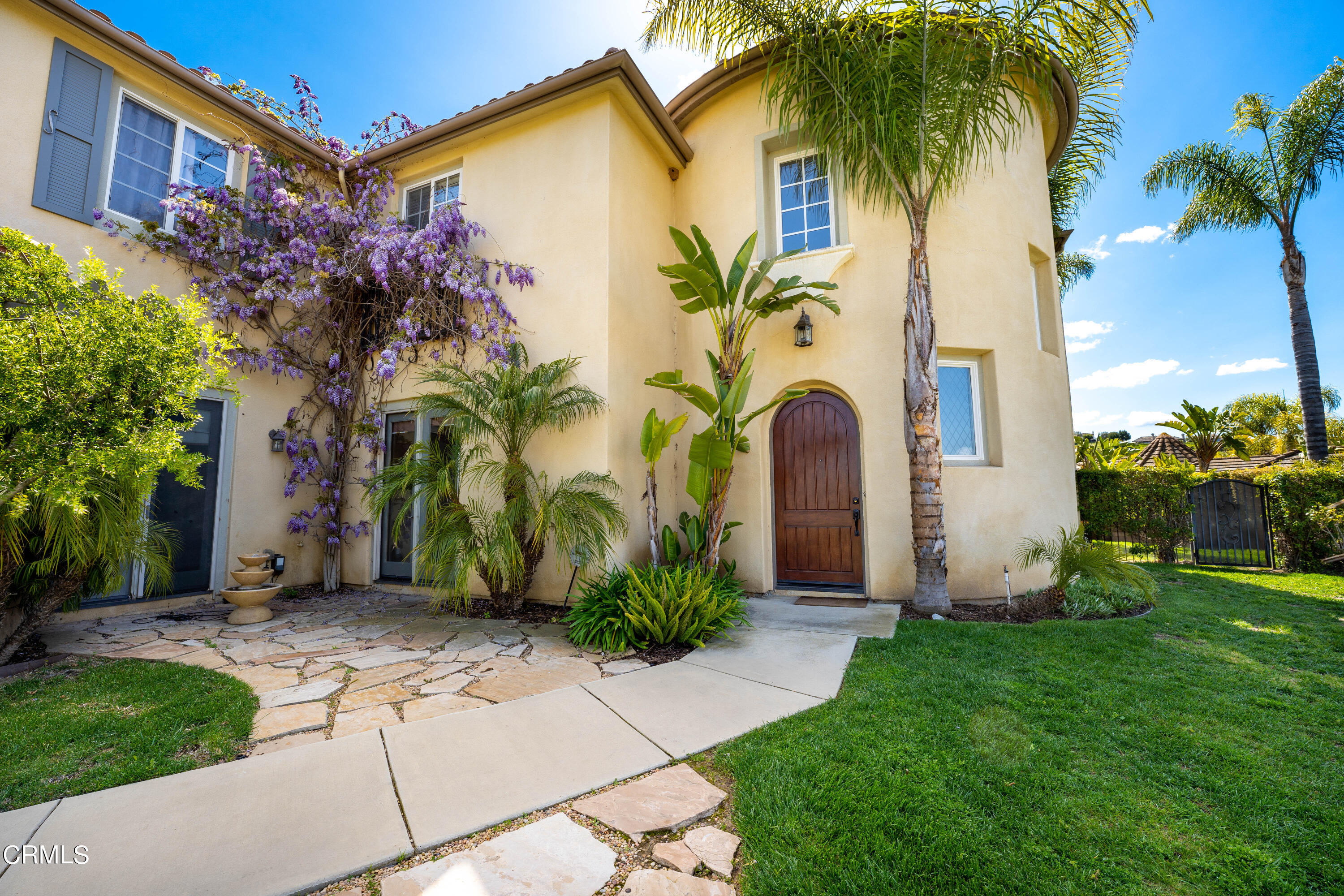 2510 Worth Way Camarillo, CA 93012 - Photo 24 of 75 a front view of a house with garden