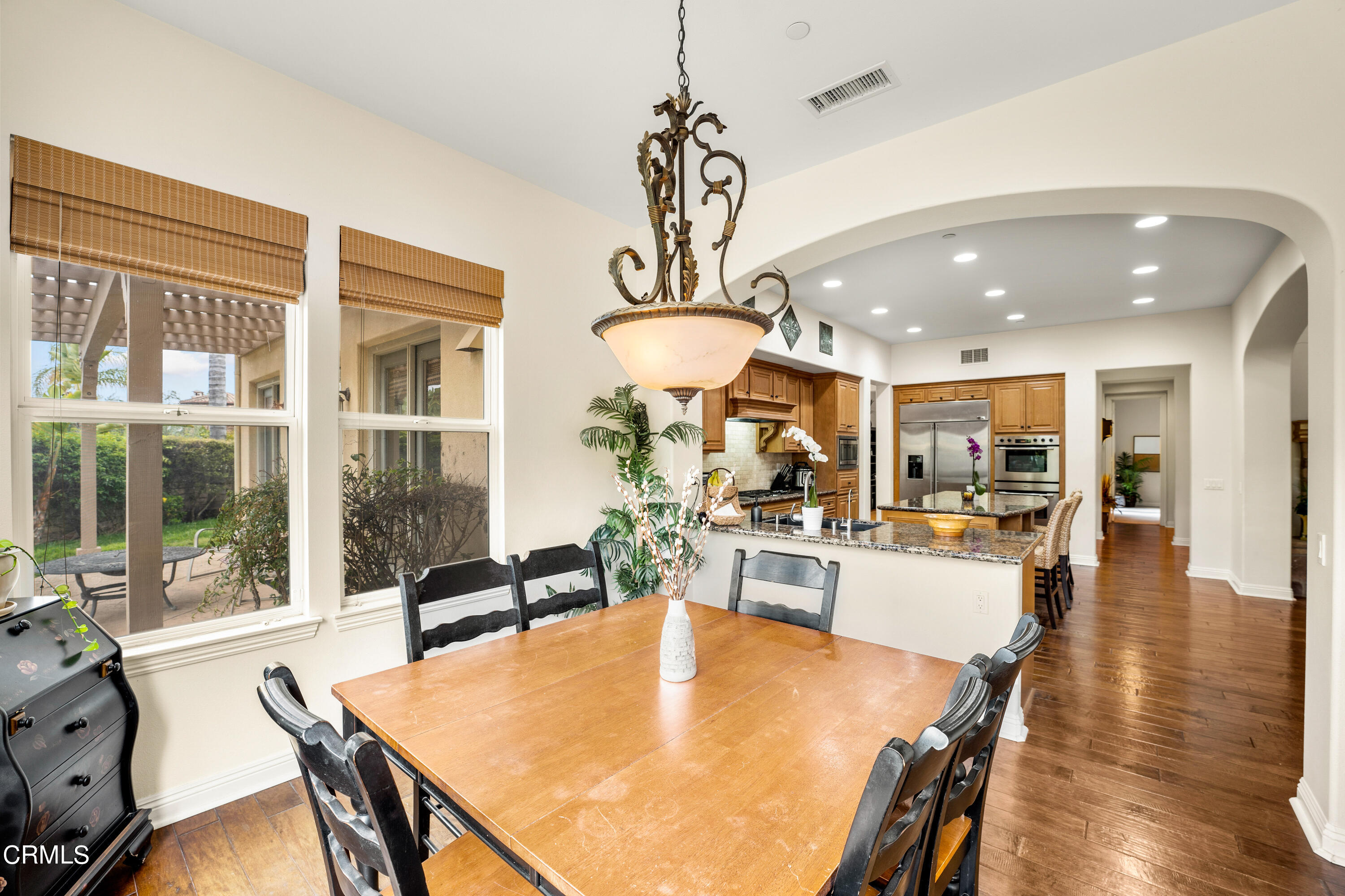 2510 Worth Way Camarillo, CA 93012 - Photo 32 of 75 a view of a dining room with furniture wooden floor and chandelier