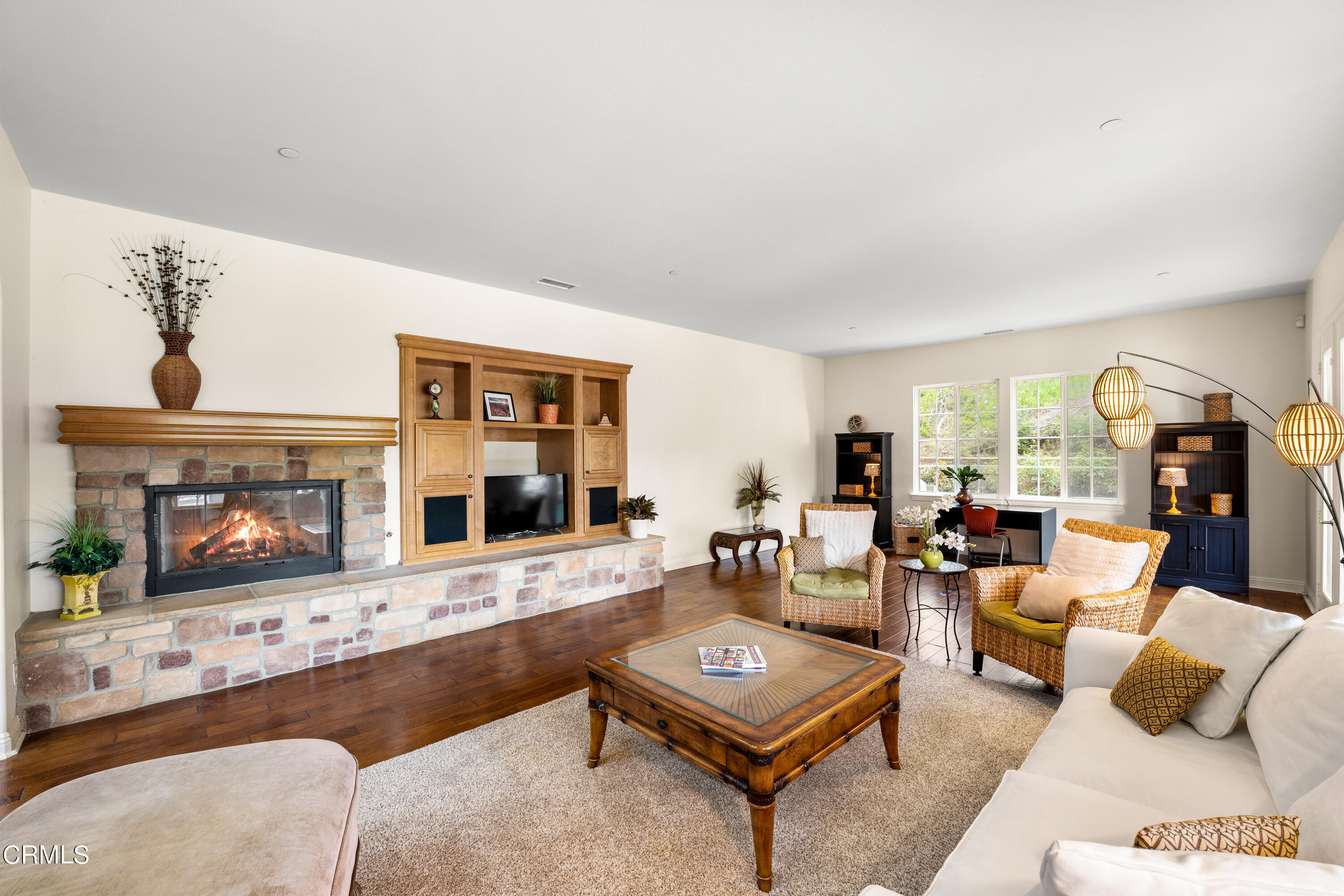 2510 Worth Way Camarillo, CA 93012 - Photo 36 of 75 a living room with furniture and a fireplace