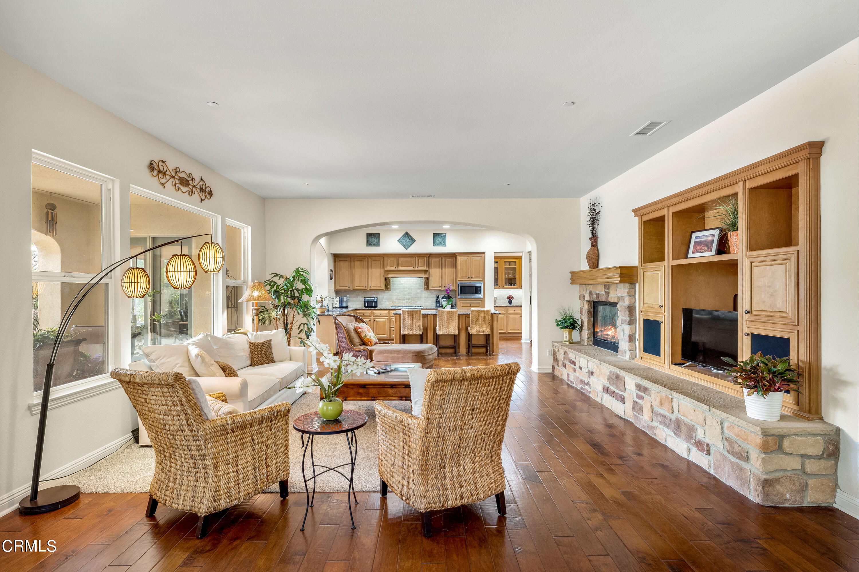 2510 Worth Way Camarillo, CA 93012 - Photo 38 of 75 a living room with fireplace furniture and a large window