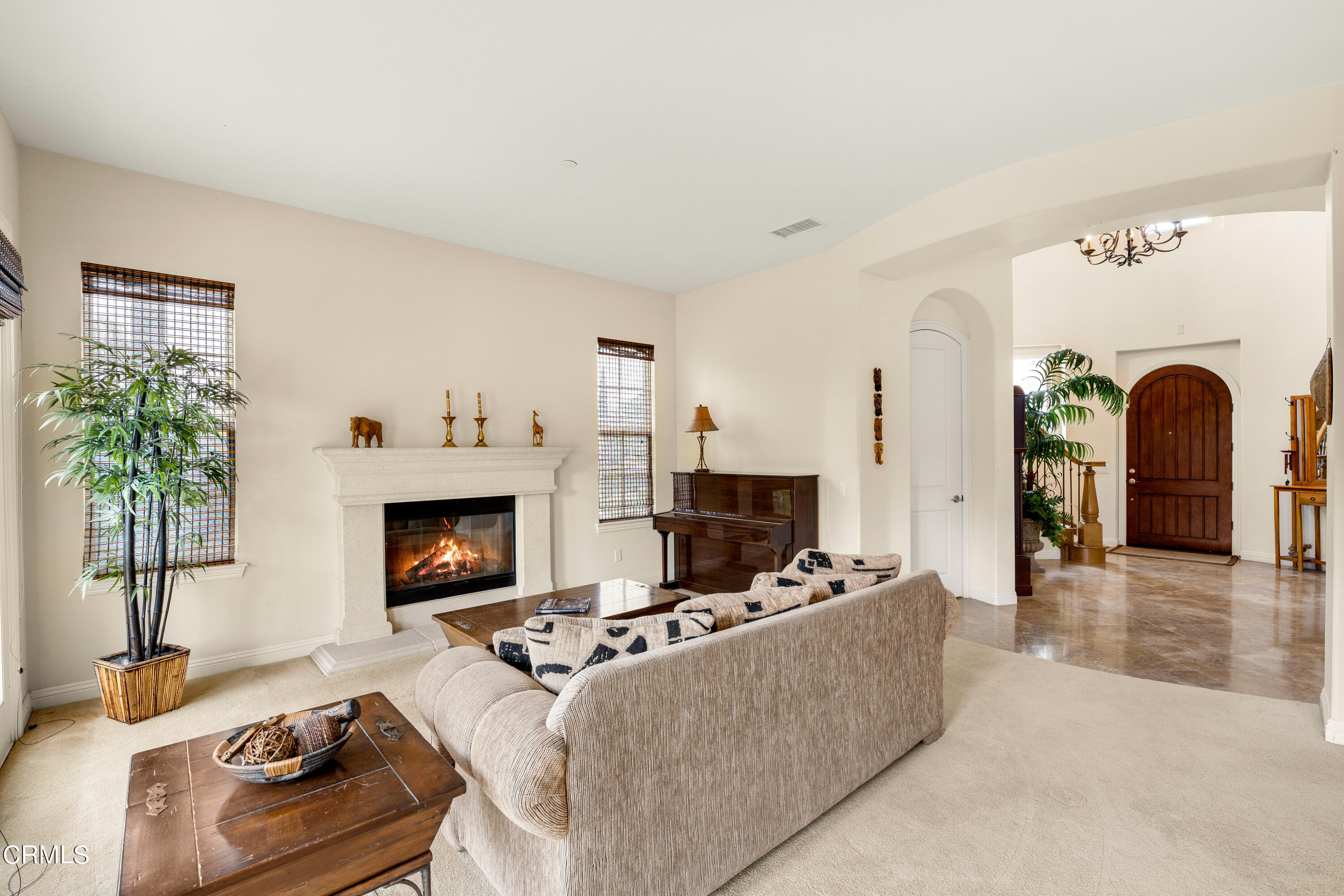 2510 Worth Way Camarillo, CA 93012 - Photo 44 of 75 a living room with furniture and a fireplace