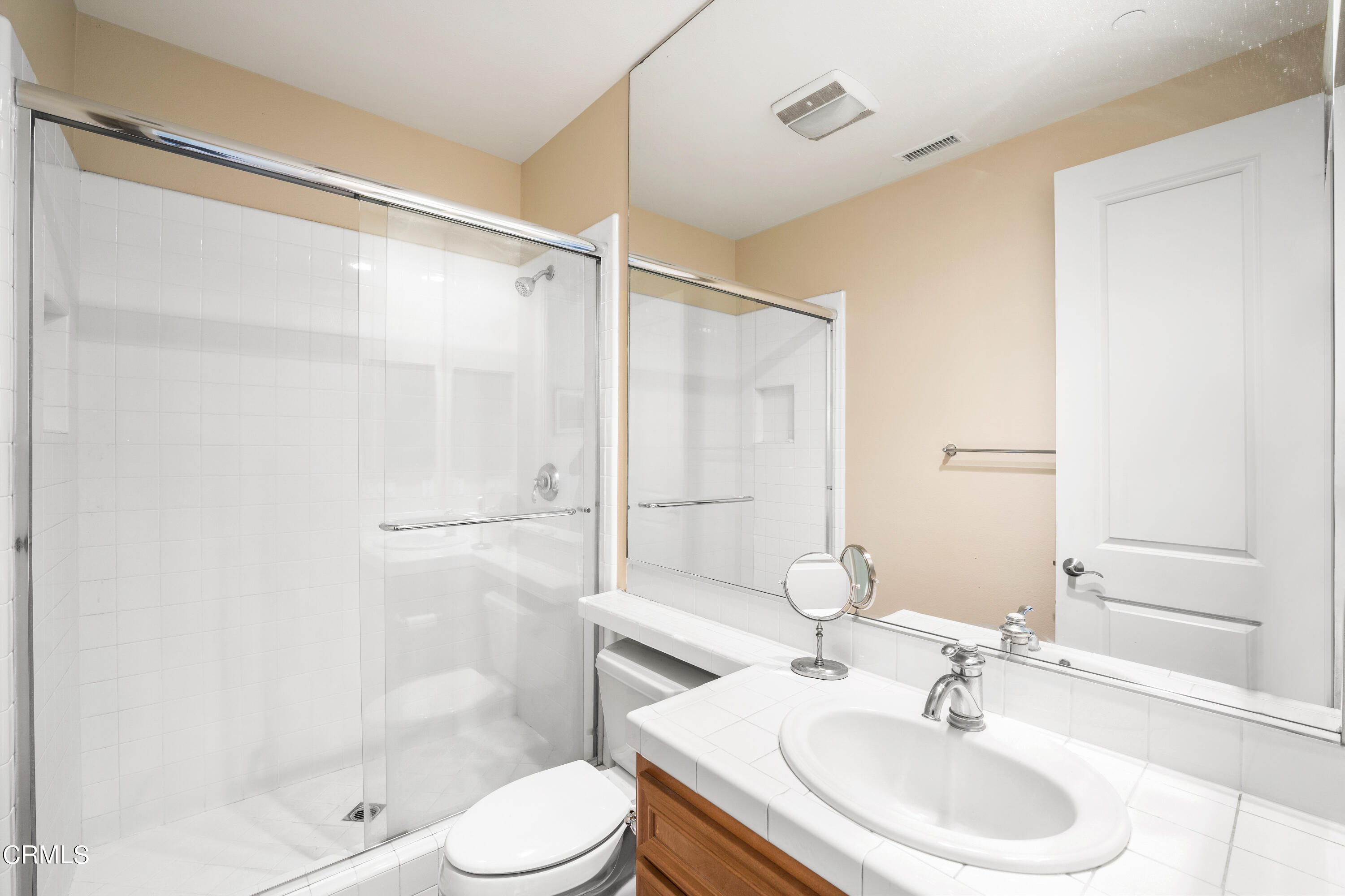 2510 Worth Way Camarillo, CA 93012 - Photo 57 of 75 a bathroom with a sink toilet and shower