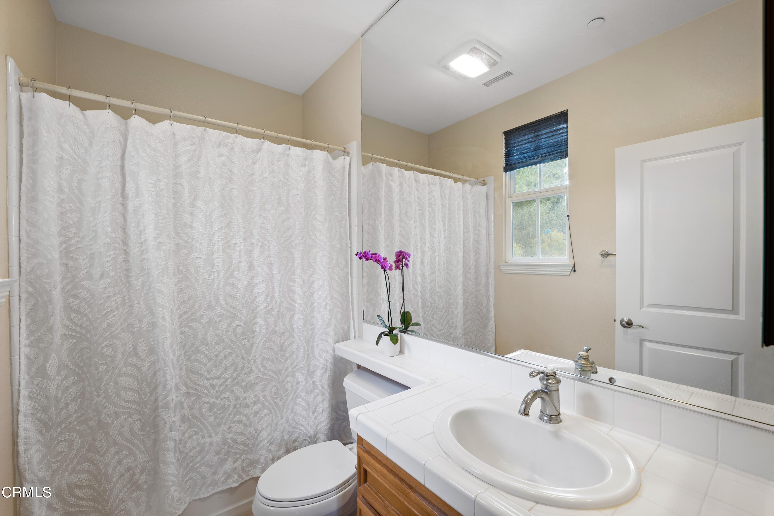 2510 Worth Way Camarillo, CA 93012 - Photo 60 of 75 a bathroom with a sink toilet and a mirror