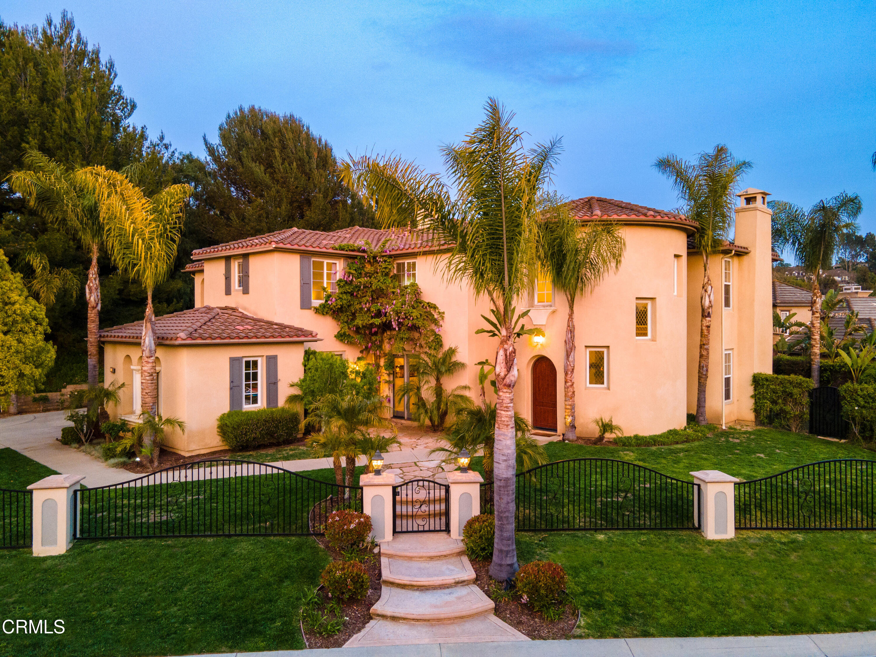 2510 Worth Way Camarillo, CA 93012 - Photo 69 of 75 a front view of a house with a garden and plants