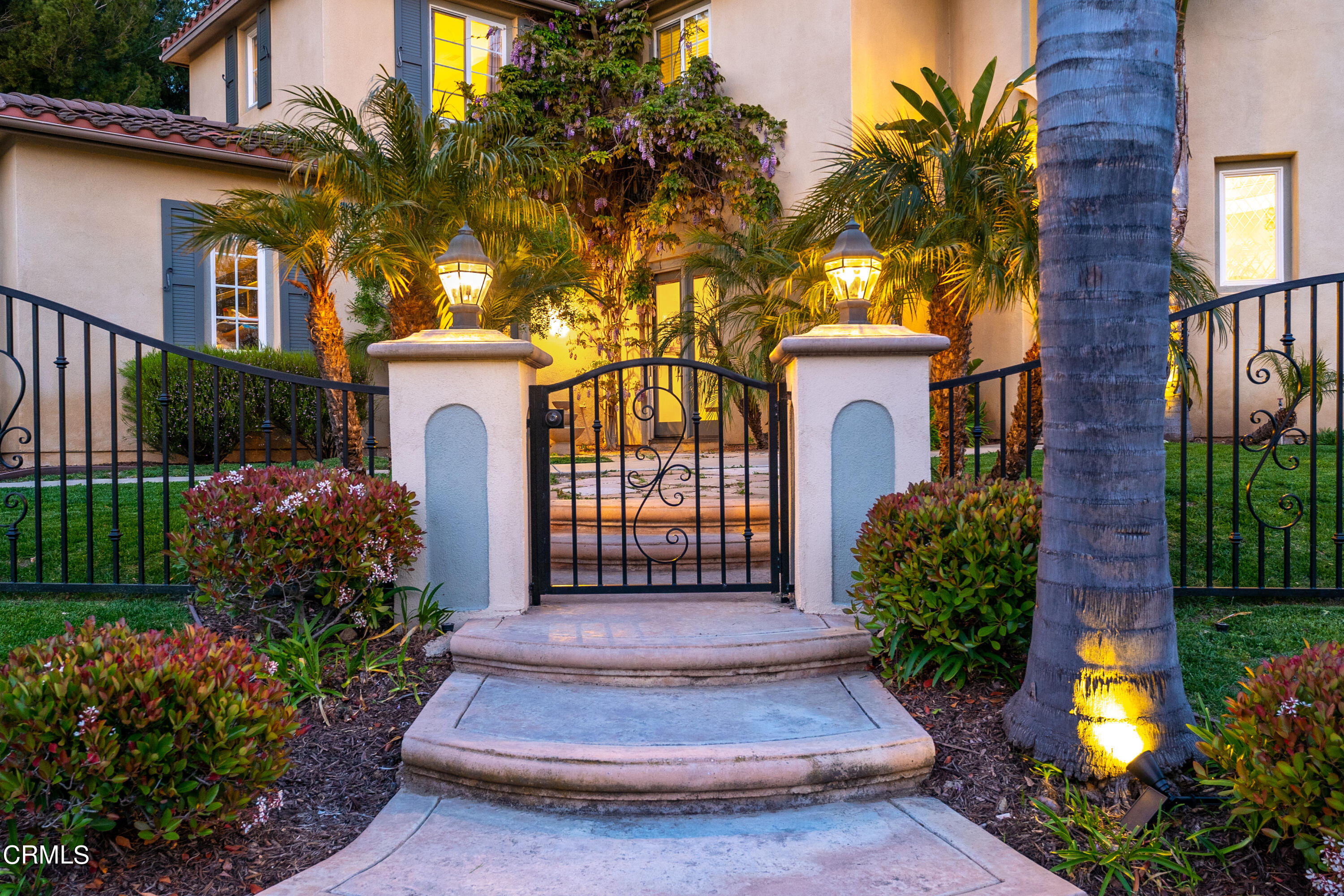 2510 Worth Way Camarillo, CA 93012 - Photo 71 of 75 a front view of a house with a garden and a yard