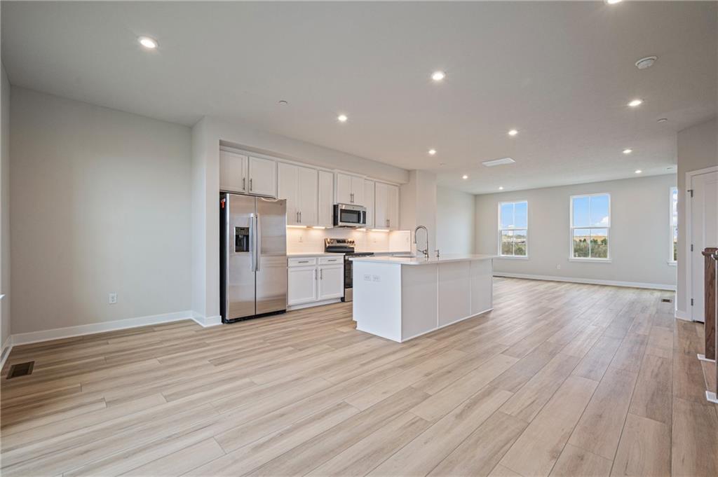106 Scenic Ridge Drive Venetia, PA 15367 - Photo 17 of 32 a view of kitchen with wooden floor and window