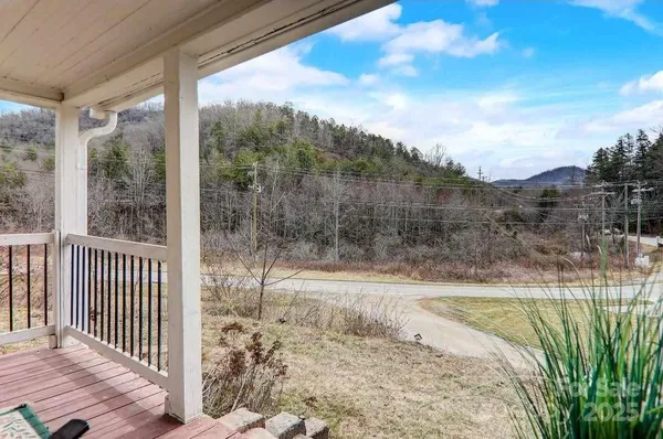 a view of a balcony with an outdoor space
