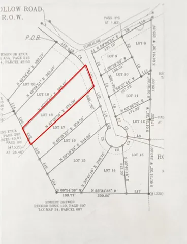 a picture of a book and a white bed