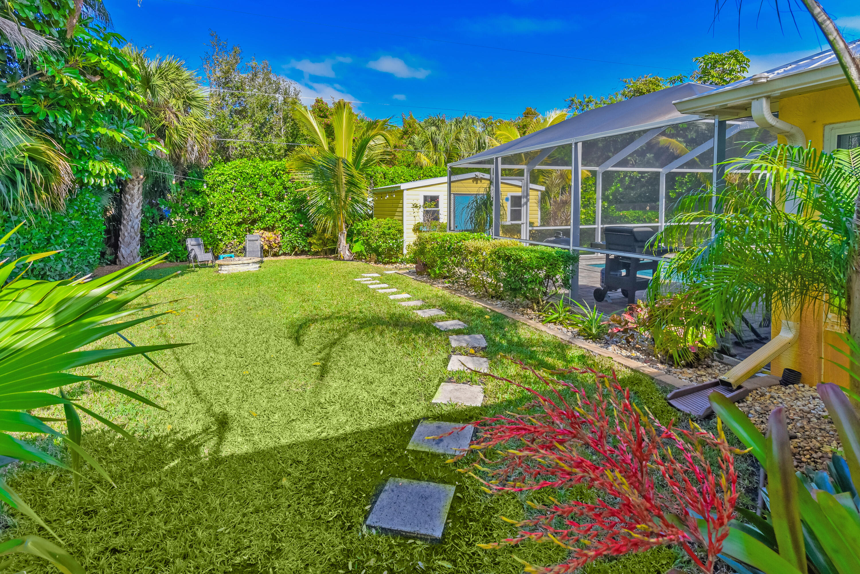 4891 Southeast Pompano Terrace Stuart, FL 34997 - Photo 17 of 57 Paved walkway to the garden