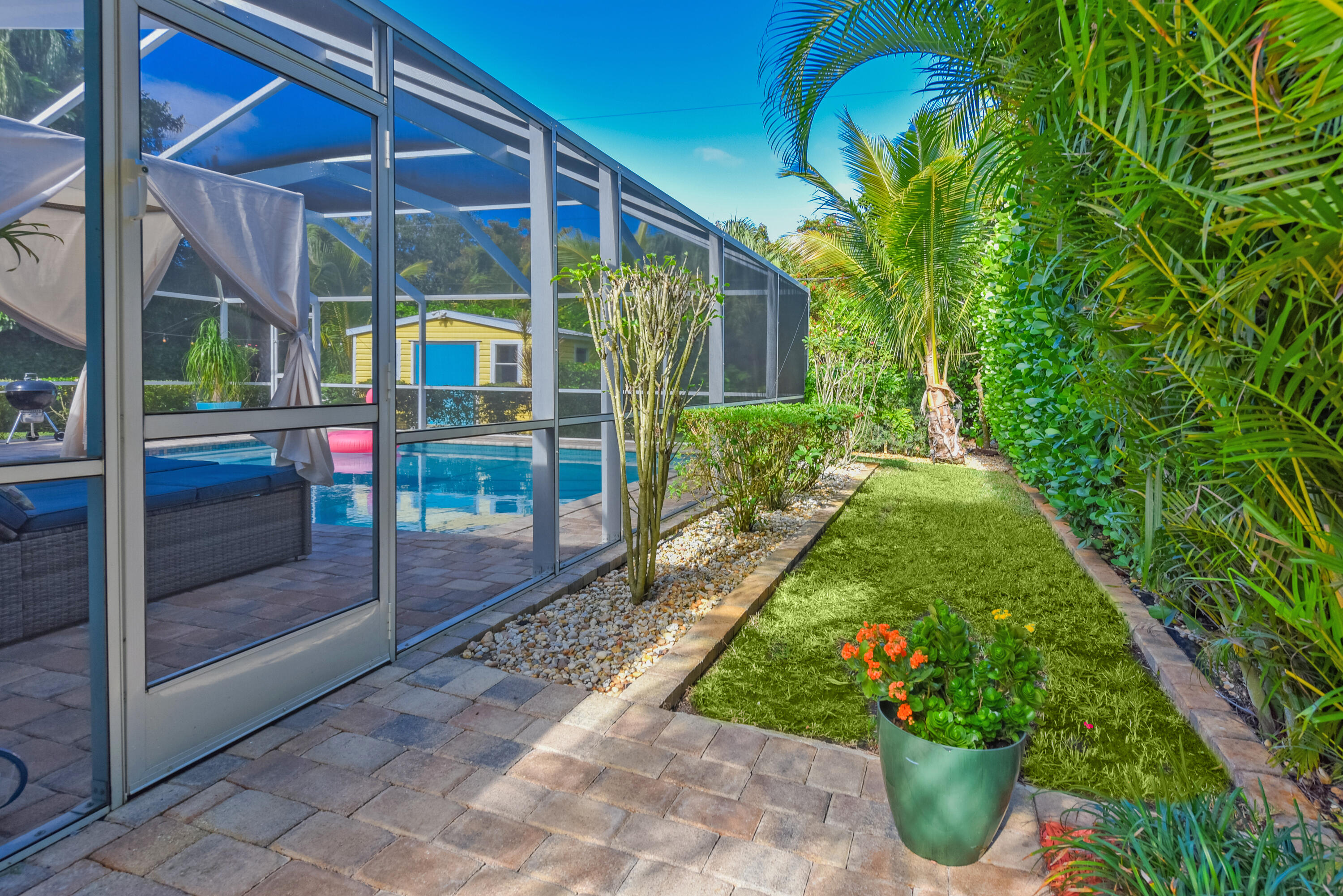 4891 Southeast Pompano Terrace Stuart, FL 34997 - Photo 22 of 57 Path to outdoor private shower