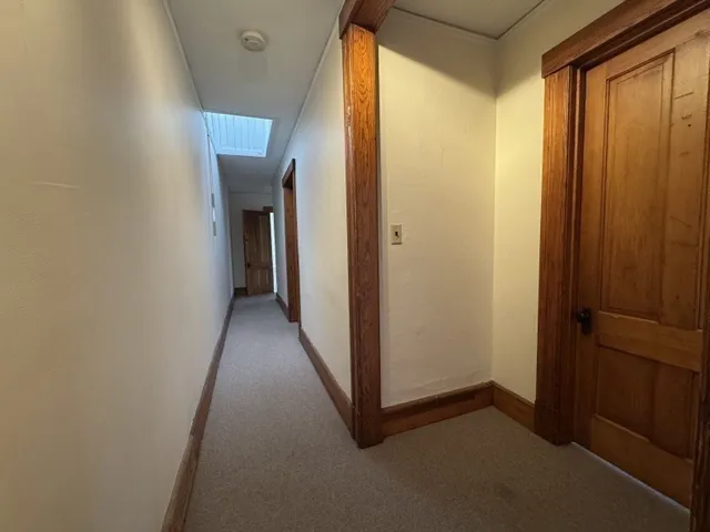 an empty room with closet area