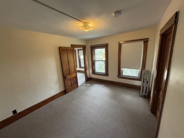 a view of a room with a sliding door