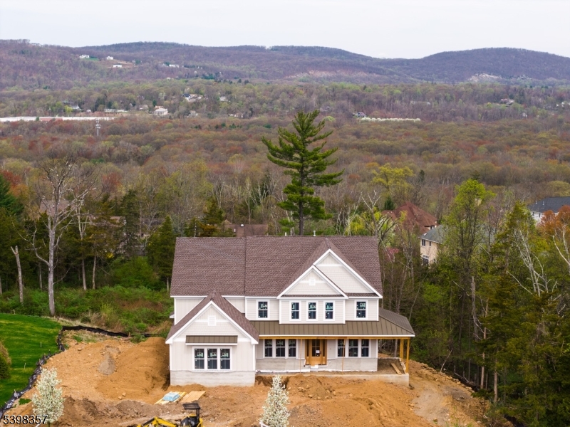 44 Roome Road Montville, NJ 07082 - Photo 2 of 9 an aerial view of residential houses and lake view