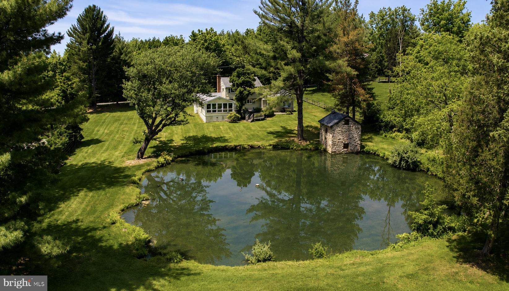 108 Sheeder Road Phoenixville, PA 19460 - Photo 38 of 42 a view of a lake with houses