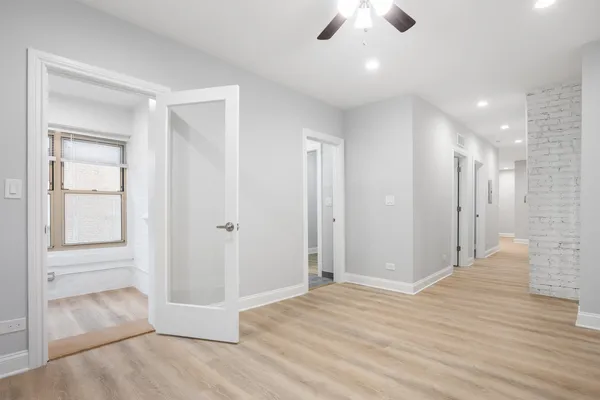 a view of entryway with wooden floor
