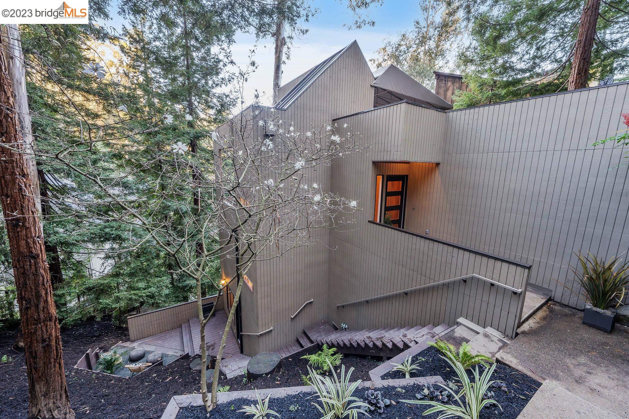a backyard of a house with lots of green space
