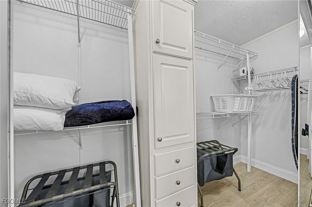 2991 Sloop Lane St. James City, FL 33956 - Photo 42 of 43 a view of walk in closet