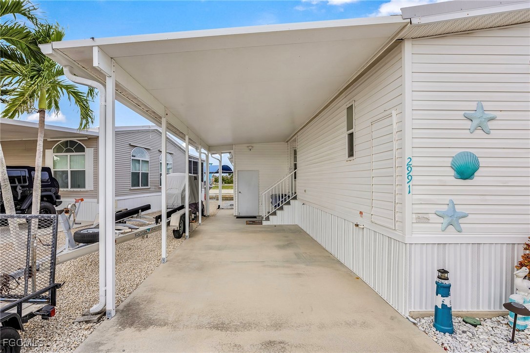 2991 Sloop Lane St. James City, FL 33956 - Photo 9 of 43 a view of a house with backyard and sitting area