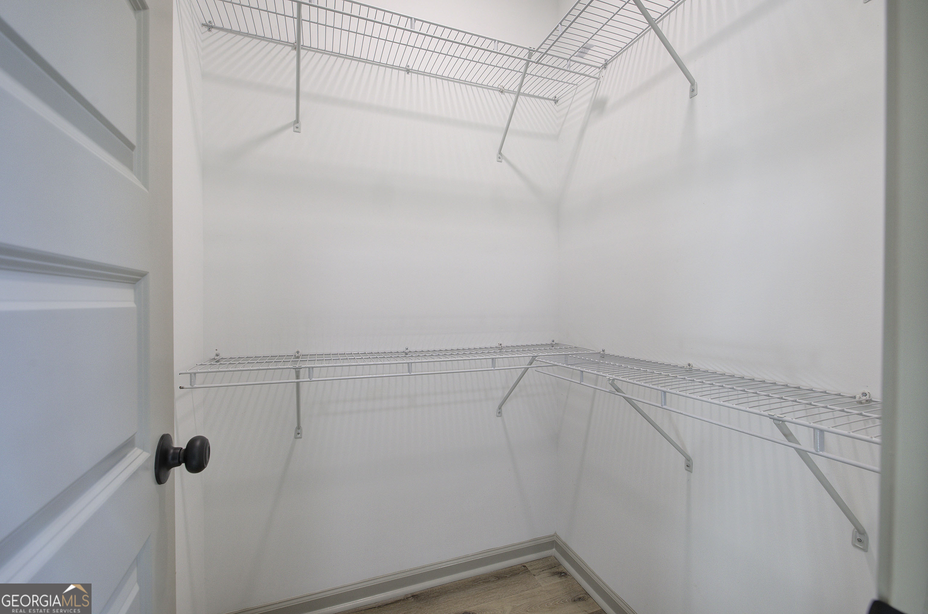 115 East Boundary Rome, GA 30161 - Photo 20 of 34 a view of a room with racks on the wall