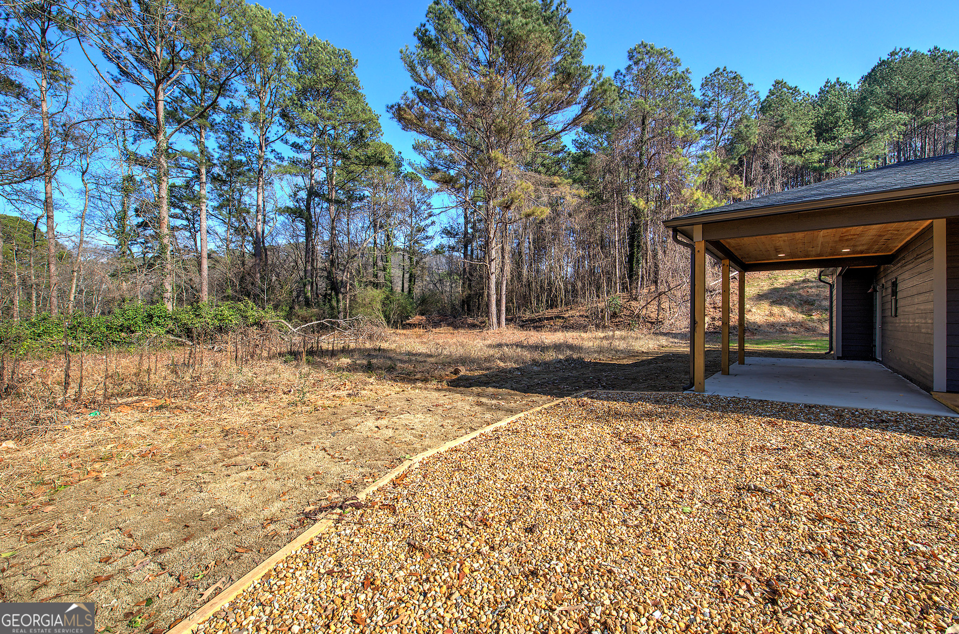 115 East Boundary Rome, GA 30161 - Photo 28 of 34 a view of a backyard with large trees