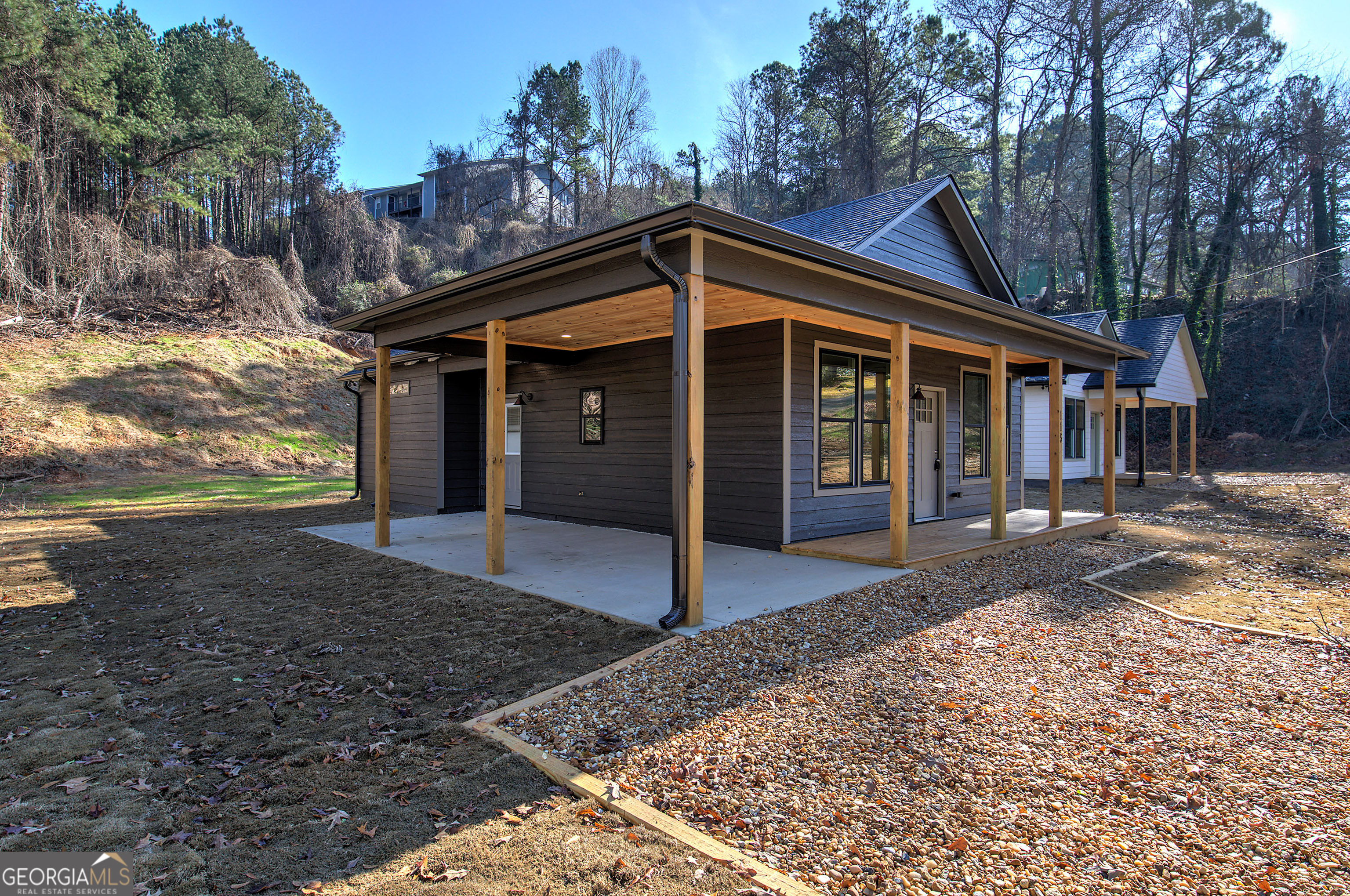 115 East Boundary Rome, GA 30161 - Photo 29 of 34 a front view of a house with a yard